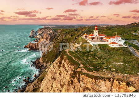 View of the Cabo da Roca Lighthouse at sunset. Sintra, Portugal. View of the Cabo da Roca Lighthouse at sunset. Sintra, Portugal. 135792946