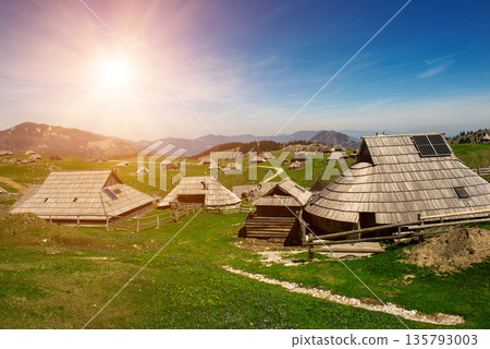 Mountain village in Alps, wooden houses in traditional style, Velika Planina, Kamnik, Slovenia Mountain village in Alps, wooden houses in traditional style, Velika Planina, Kamnik, Slovenia 135793003
