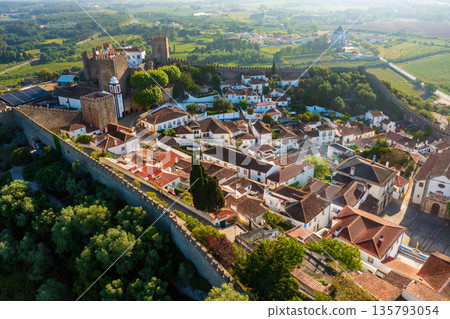 Aerial view of Obidos with historic walls and castle, Leiria district, Portugal Aerial view of Obidos with historic walls and castle, Leiria district, Portugal 135793054