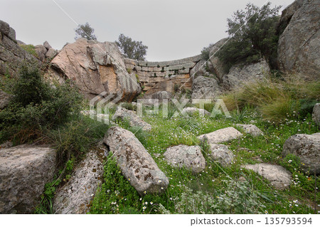 Ruined walls of castle over the lake Bafa in a nature reserve situated in southwestern Turkey 135793594
