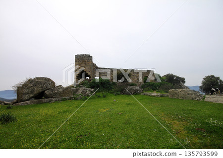 Ruined walls of castle over the lake Bafa in a nature reserve situated in southwestern Turkey Ruined walls of castle over the lake Bafa in a nature reserve situated in southwestern Turkey 135793599