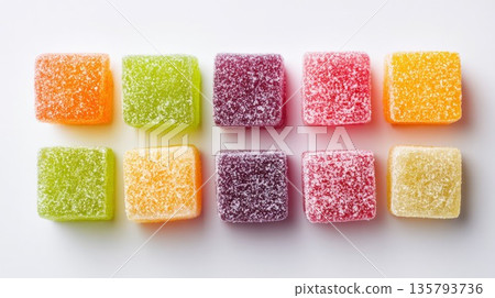 Colorful fruit jelly candies arranged on white background Colorful fruit jelly candies arranged on white background 135793736