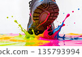 The sole of the sneaker comes in a multi-colored paint with bright splashes. 135793994