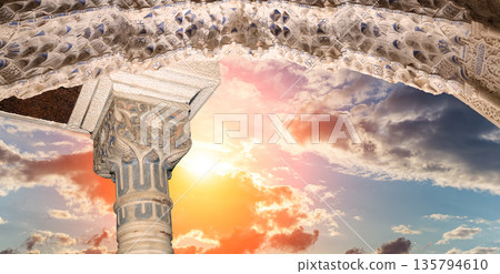 Arches in Islamic (Moorish) style (against the sunset) in Alhambra, Granada, Spain Arches in Islamic (Moorish) style (against the sunset) in Alhambra, Granada, Spain 135794610