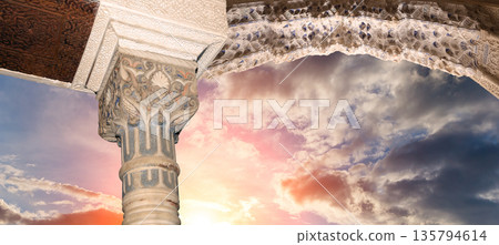 Arches in Islamic (Moorish) style (against the sunset) in Alhambra, Granada, Spain Arches in Islamic (Moorish) style (against the sunset) in Alhambra, Granada, Spain 135794614