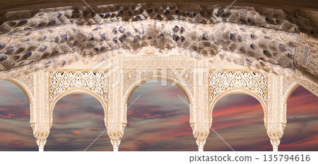 Arches in Islamic (Moorish) style (against the sunset) in Alhambra, Granada, Spain Arches in Islamic (Moorish) style (against the sunset) in Alhambra, Granada, Spain 135794616