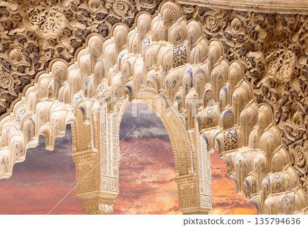 Arches in Islamic (Moorish) style (against the sunset) in Alhambra, Granada, Spain Arches in Islamic (Moorish) style (against the sunset) in Alhambra, Granada, Spain 135794636