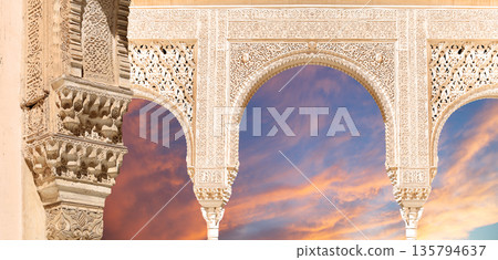 Arches in Islamic (Moorish) style (against the sunset) in Alhambra, Granada, Spain Arches in Islamic (Moorish) style (against the sunset) in Alhambra, Granada, Spain 135794637