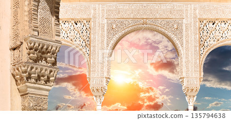 Arches in Islamic (Moorish) style (against the sunset) in Alhambra, Granada, Spain Arches in Islamic (Moorish) style (against the sunset) in Alhambra, Granada, Spain 135794638