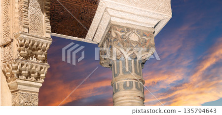 Arches in Islamic (Moorish) style (against the sunset) in Alhambra, Granada, Spain Arches in Islamic (Moorish) style (against the sunset) in Alhambra, Granada, Spain 135794643