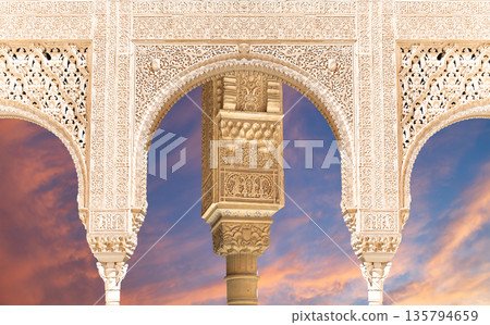 Arches in Islamic (Moorish) style (against the sunset) in Alhambra, Granada, Spain Arches in Islamic (Moorish) style (against the sunset) in Alhambra, Granada, Spain 135794659