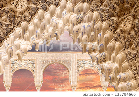 Arches in Islamic (Moorish) style (against the sunset) in Alhambra, Granada, Spain  135794666