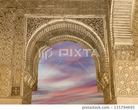 Arches in Islamic (Moorish) style (against the sunset) in Alhambra, Granada, Spain Arches in Islamic (Moorish) style (against the sunset) in Alhambra, Granada, Spain 135794695