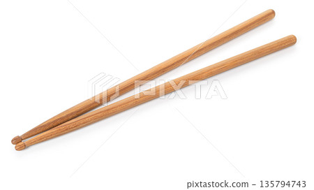 Pair of wooden drumsticks for playing percussion music 135794743