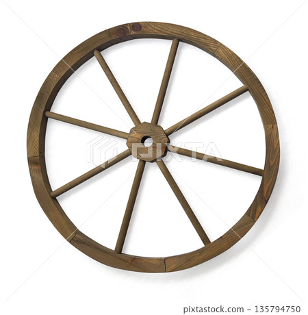 Rustic wooden wagon wheel with spokes on white 135794750
