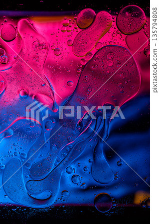 Colorful oil and water macro with strong blue and pink contrast. 135794808