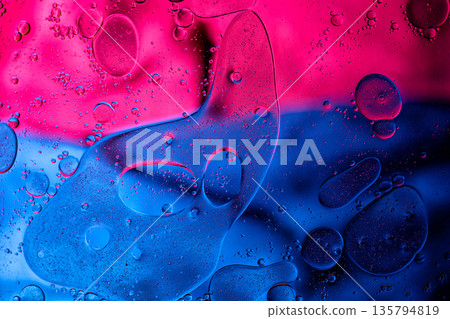 Abstract blend of pink and blue liquids with soft transitions and bubbles. Abstract blend of pink and blue liquids with soft transitions and bubbles. 135794819