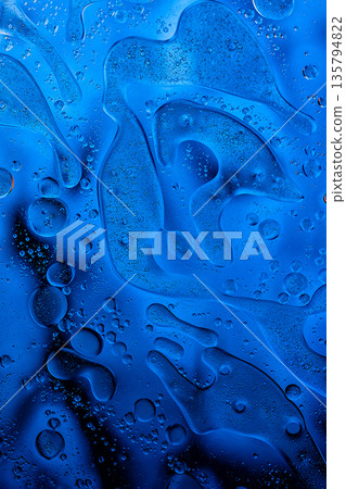 Deep blue fluid surface with organic shapes, modern abstract design. Deep blue fluid surface with organic shapes, modern abstract design. 135794822