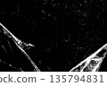 Black background with sharp white scratches, high-contrast grunge texture. 135794831