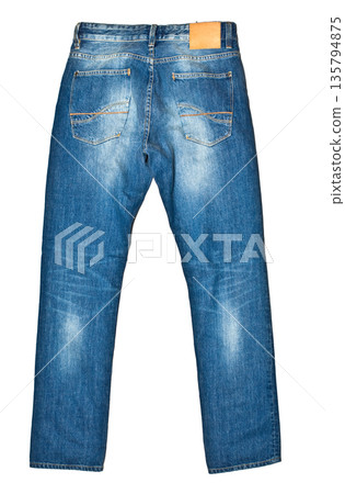 Blue denim jeans back view with leather patch 135794875