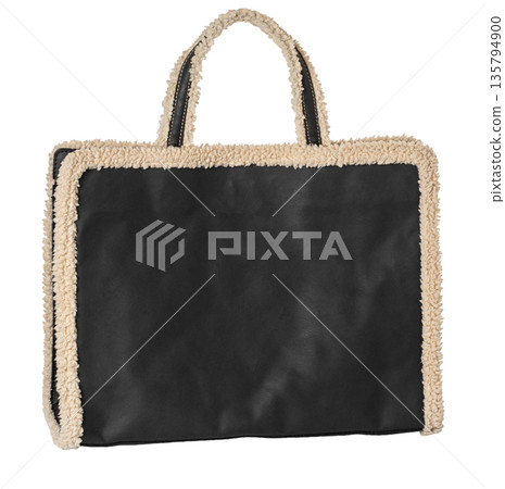 Black leather tote bag with shearling trim, transparent background 135794900