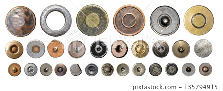 Assortment of metal rivets, buttons, and snaps on transparent background Assortment of metal rivets, buttons, and snaps on transparent background 135794915