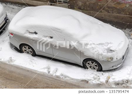 Car Covered With Snow 135795474
