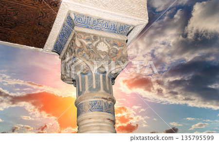 Columns in Islamic (Moorish) style in Alhambra (against the sunset), Granada, Spain Columns in Islamic (Moorish) style in Alhambra (against the sunset), Granada, Spain 135795599