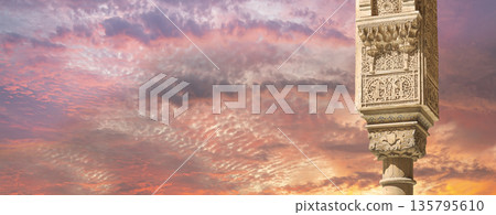 Columns in Islamic (Moorish)  style in Alhambra (against the sunset), Granada, Spain 135795610