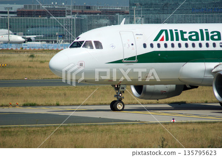 Frankfurt, Germany, July 09 2017: Italian Airbus A320 Taxiing Past Spotting Point Toward Runway 135795623