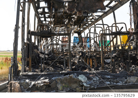 Burned Bus Cabin Burned Bus Cabin 135795629