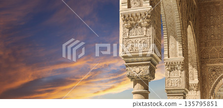 Columns in Islamic (Moorish) style in Alhambra (against the sunset), Granada, Spain Columns in Islamic (Moorish) style in Alhambra (against the sunset), Granada, Spain 135795851