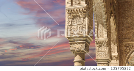 Columns in Islamic (Moorish) style in Alhambra (against the sunset), Granada, Spain Columns in Islamic (Moorish) style in Alhambra (against the sunset), Granada, Spain 135795852