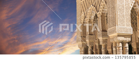 Columns in Islamic (Moorish) style in Alhambra (against the sunset), Granada, Spain Columns in Islamic (Moorish) style in Alhambra (against the sunset), Granada, Spain 135795855
