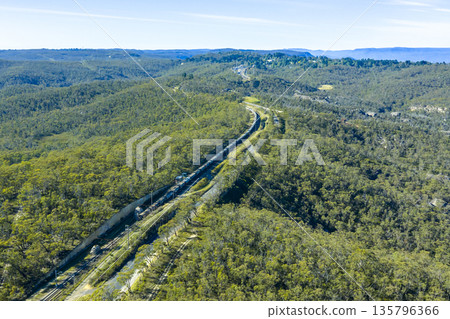 Drone photograph of a train in the Grose Valley in the Blue Mountains 135796366