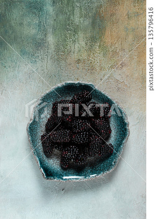 fresh blackberry berry, on a plate, top view, no people, 135796416