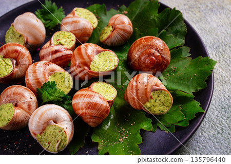grape snails , stuffed in burgundy, french cuisine, 135796440