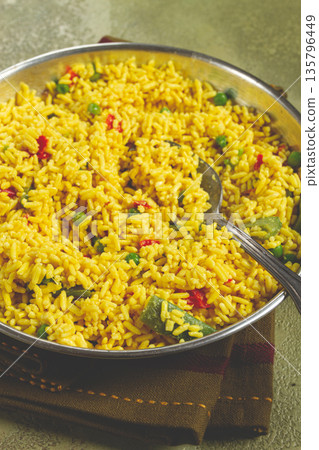 rice with saffron and vegetables, in a frying pan, top view, homemade, no people, 135796449