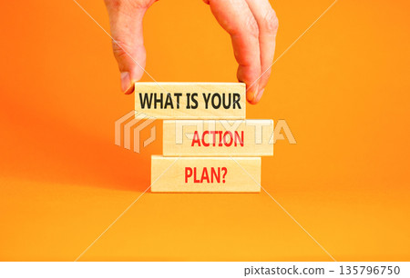 What is your action plan symbol. Concept words What is your action plan on beautiful blocks. Beautiful orange background. Businessman's hand. Business what is your action plan concept. Copy space. What is your action plan symbol. Concept words What is your action plan on beautiful blocks. Beautiful orange background. Businessman's hand. Business what is your action plan concept. Copy space. 135796750