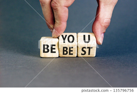 Motivational be you and best symbol. Concept words Be you Be best on beautiful wooden block. Beautiful grey background Businessman hand. Business motivational be you and best concept. Copy space. 135796756