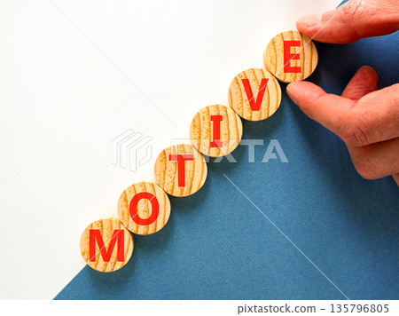 Motive support and help symbol. Concept word Motive on beautiful wooden circles. Beautiful blue and white background. Business psychological motive support and help concept. Copy space. Motive support and help symbol. Concept word Motive on beautiful wooden circles. Beautiful blue and white background. Business psychological motive support and help concept. Copy space. 135796805