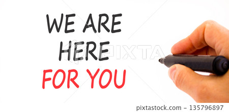 Support, help and we are here for you symbol. Concept words We are here for you on beautiful paper. Beautiful white background. Businessman's hand. Business we are here for you concept. Copy space. Support, help and we are here for you symbol. Concept words We are here for you on beautiful paper. Beautiful white background. Businessman's hand. Business we are here for you concept. Copy space. 135796897