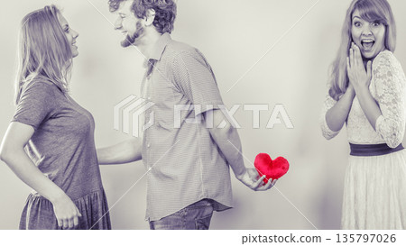 Handsome man betrayed women 135797026