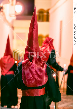 Back view of a nazareno in a holy week procession 135797098