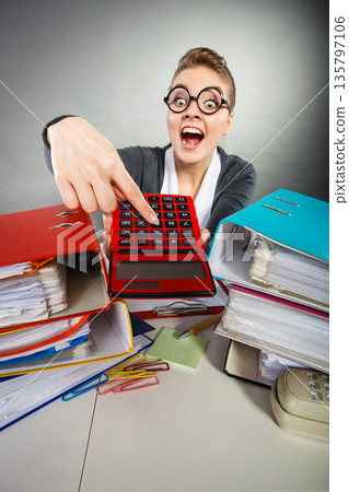 Workaholic secretary making gestures. Workaholic secretary making gestures. 135797106