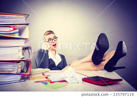 Secretary making phone call. 135797119