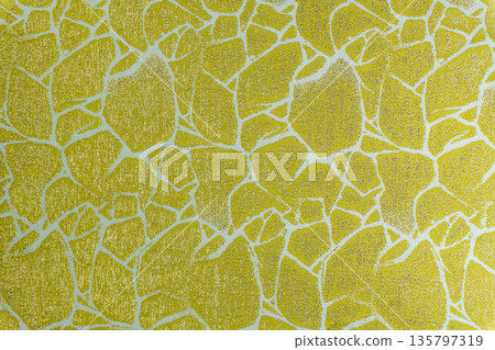 Mustard yellow textile texture with golden cracked mosaic motif Mustard yellow textile texture with golden cracked mosaic motif 135797319