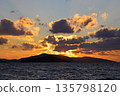 sunset on the beach. Seaside town of Turgutreis and spectacular sunsets. Selective Focus. 135798120