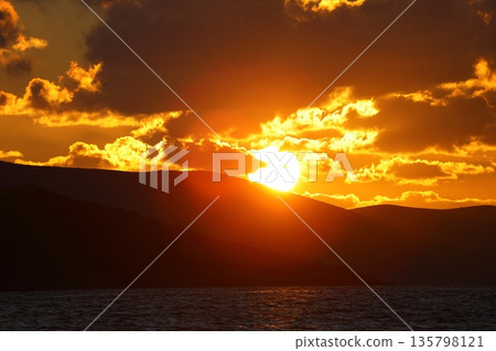 sunset on the beach. Seaside town of Turgutreis and spectacular sunsets. Selective Focus. sunset on the beach. Seaside town of Turgutreis and spectacular sunsets. Selective Focus. 135798121
