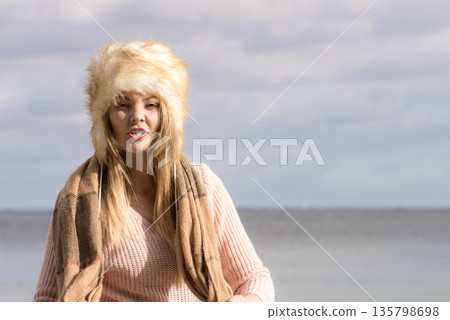 Fashionable woman on beach Fashionable woman on beach 135798698